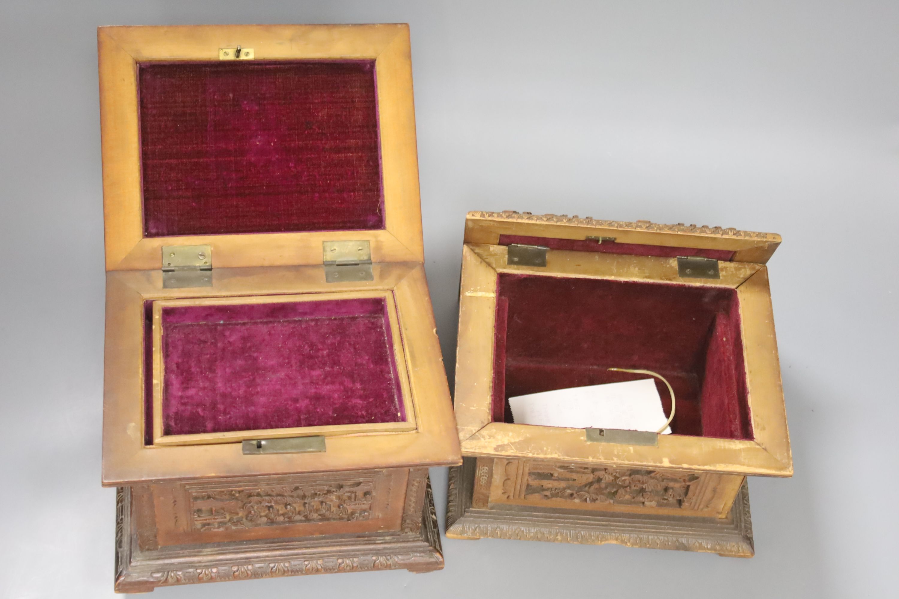 Three Chinese carved hardwood caskets, largest 19 x 15cm 13cm high